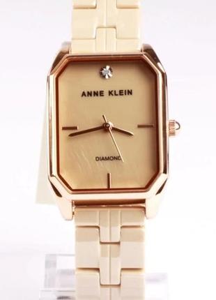 Женские часы anne klein ak/4034rgtn. женские часы керамика, бежевая1 фото