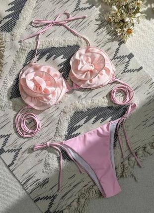 Розовый купальник бикини с объемными цветами9 фото