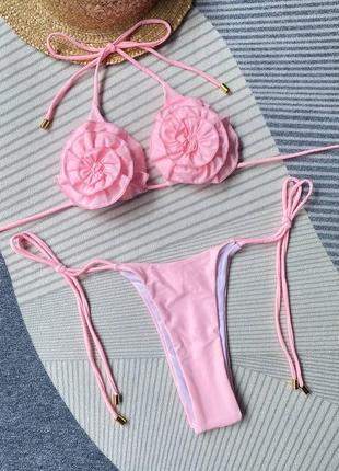 Розовый купальник бикини с объемными цветами8 фото