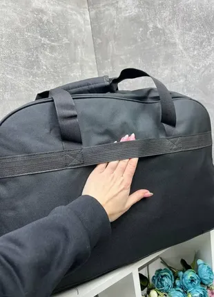 Дорожная сумка с доп. карманами и ремешком для цепляния сумки на ручку чемодана -размер l5 фото