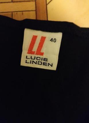 Актуальная хлопковая футболка с декором легендарного модного бренда lucia linden.4 фото