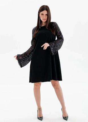 Чорна сукня-трапеція з блискучими рукавами4 фото