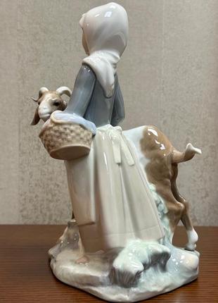Порцелянова статуетка lladro «дівчина з козою».3 фото