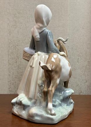 Порцелянова статуетка lladro «дівчина з козою».4 фото