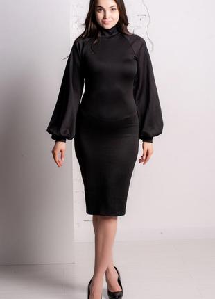 Елегантне плаття-футляр по коліно з рукавом реглан, однотонне, обтягуюче, трикотажне. чорне1 фото