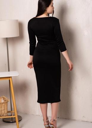 Женское трикотажное платье-футляр миди с рукавами три четверти, обтягивающее по фигуре. черное5 фото
