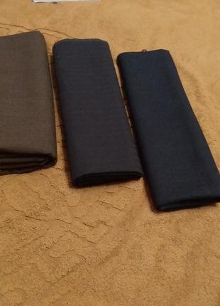 Отрезы костюмных тканей: черный, черный в полоску, коричневый