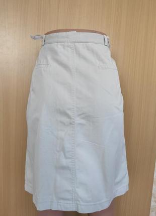Светлая бежевая белая короткая юбка с карманами2 фото
