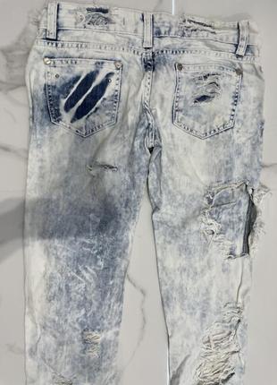 Женские рваные джинсы5 фото