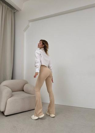 Базові теплі штани-легінси кльош в рубчик 🔥9 фото