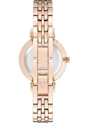 Женские часы anne klein ak/2158byrg, розовое золото с бордовым2 фото