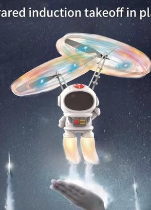 Летающий "космонавт" электрический ударостойкий левитирующий спиннер бумеранг запускалка с led подсветкой3 фото