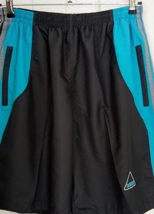 Пляжные шорты на сеточке.adidas