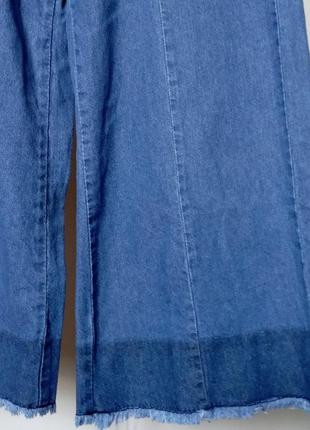 Джинси кюлоти с сині з необробленим краєм укорочені5 фото