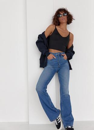 Женские джинсы клеш с круглой кокеткой сзади5 фото