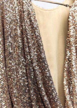 Коротка сукня з паєтками4 фото
