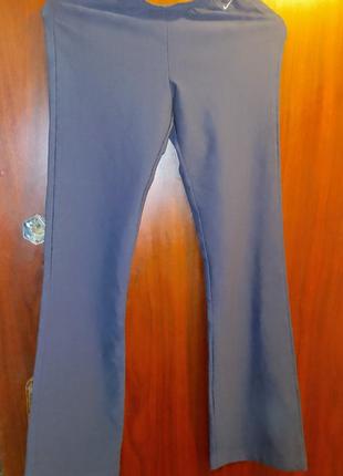Эластичные синие брюки женские. размер м