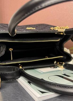 Женская черная сумка guess с ручками и плечевым ремнем.2 фото