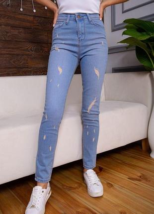 Рвані жіночі джинси скінні, блакитного кольору, 164r681