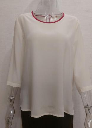 Ніжна біла блуза з рожевим кантом