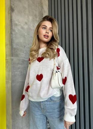Стильний білий вʼязаний светр оверсайз з червоними сердечками 2024