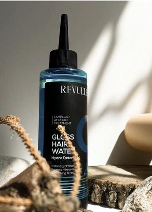 Вода для блеска волос - увлажняющее распутывание revuele