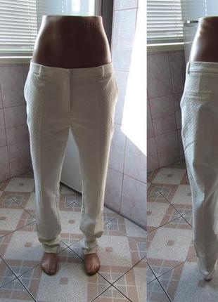 Абсолютно нові світлі штани з маркою фірми "moxito"1 фото