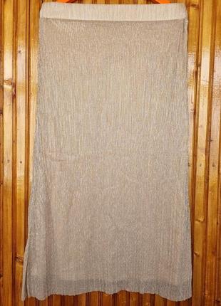 Гофрированная юбка-миди с золотистой и серебристой нитью.3 фото