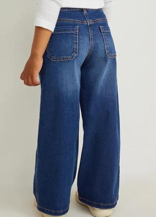 Стильные широкие джинсы с ремнем9 фото