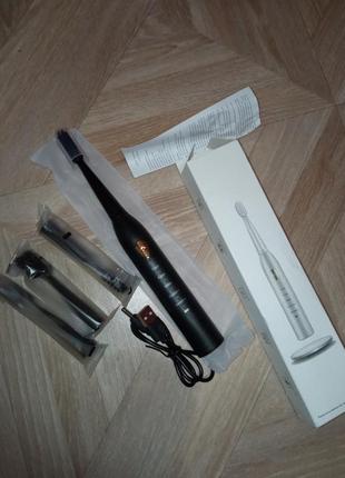 Електрична зубна щітка чорна і 4 насадки5 фото