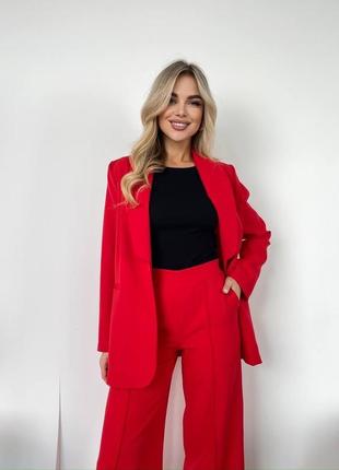 Качественный женский деловой костюм пиджак и широкие брюки прямого кроя со стрелкой класси...