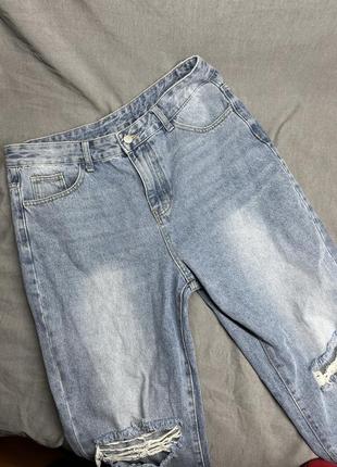 Синие джинсы с потертостями4 фото