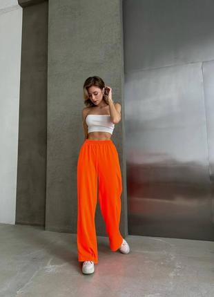 Неймовірно якісні стильні яскраві помаранчеві штани 🥰вільного крою на резинці 2024