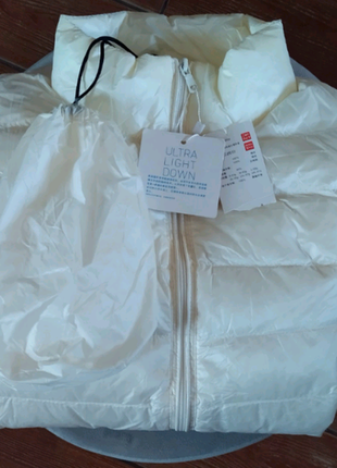 Ультра легкий кремовый пуховик весом 43 г куртка молочная бежевая ванильная стеганая6 фото