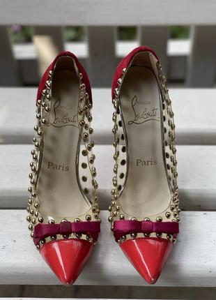 Червоні туфлі із заклепками christian louboutin9 фото