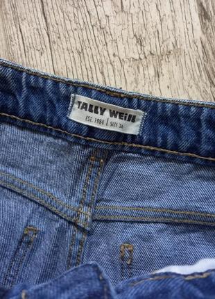 Стильные джинсовые шорты с потертостями премиум джинс высокая посадка5 фото