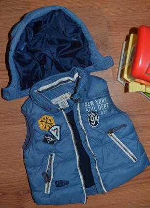 Жилетка безрукавка.