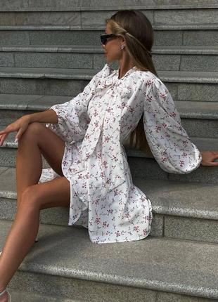 Жіноча стильна молочна легка елегантна сукня з квітковим принтом 20242 фото