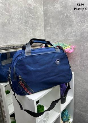 Синя - 43х30х18 см - дорожня сумка з додатковими кишенями та ремінцем для чіпляння сумки на ручку валізи - розмір s (5139)1 фото