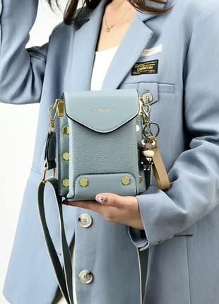 Стильна шкіряна жіноча сумочка