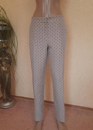 Штани в принт зауженые від next