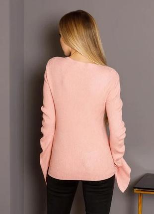 Рожевий светр із розрізами на рукавах3 фото