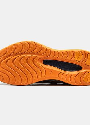 Чоловічі кросівки чорні з помаранчевим у стилі asics gel-kinsei max7 фото