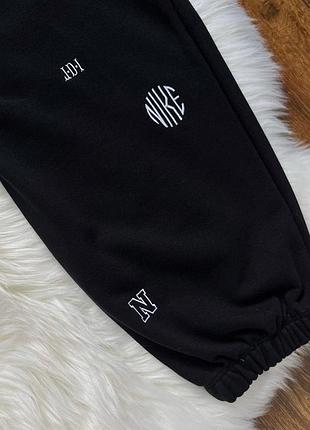 Спортивные штаны джогеры zwart nike sportswear icon clash cv8481 jogger dr6227-0107 фото
