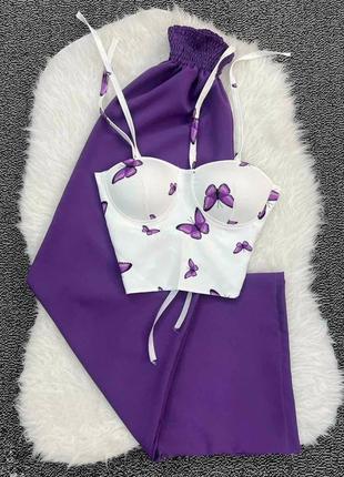Женский невероятный стильный легкий летний костюм фиолетовые брюки с белым топом бабочками.5 фото