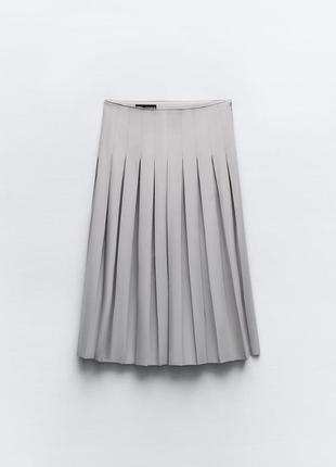Плиссированная юбка средней длины6 фото
