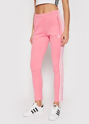 Рожеві спортивні штани adidas