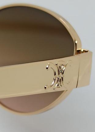Очки в стиле celine triomphe metal женские солнцезащитные овальные коричневый градиент в золотой металлической оправе8 фото