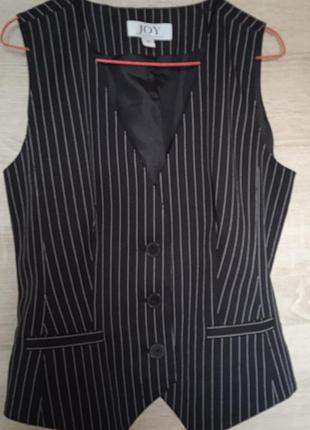 Жіночій жилет.