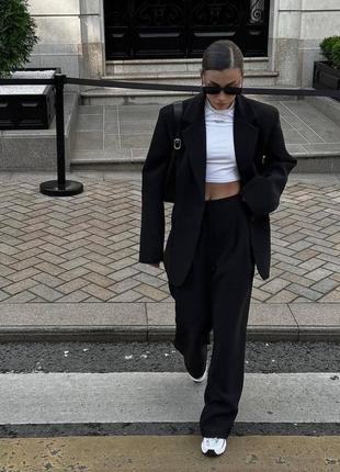 Костюм женский однотонный классический оверсайз пиджак на пуговице брюки свободного кроя на высокой посадке качественный базовый графитовый черный5 фото